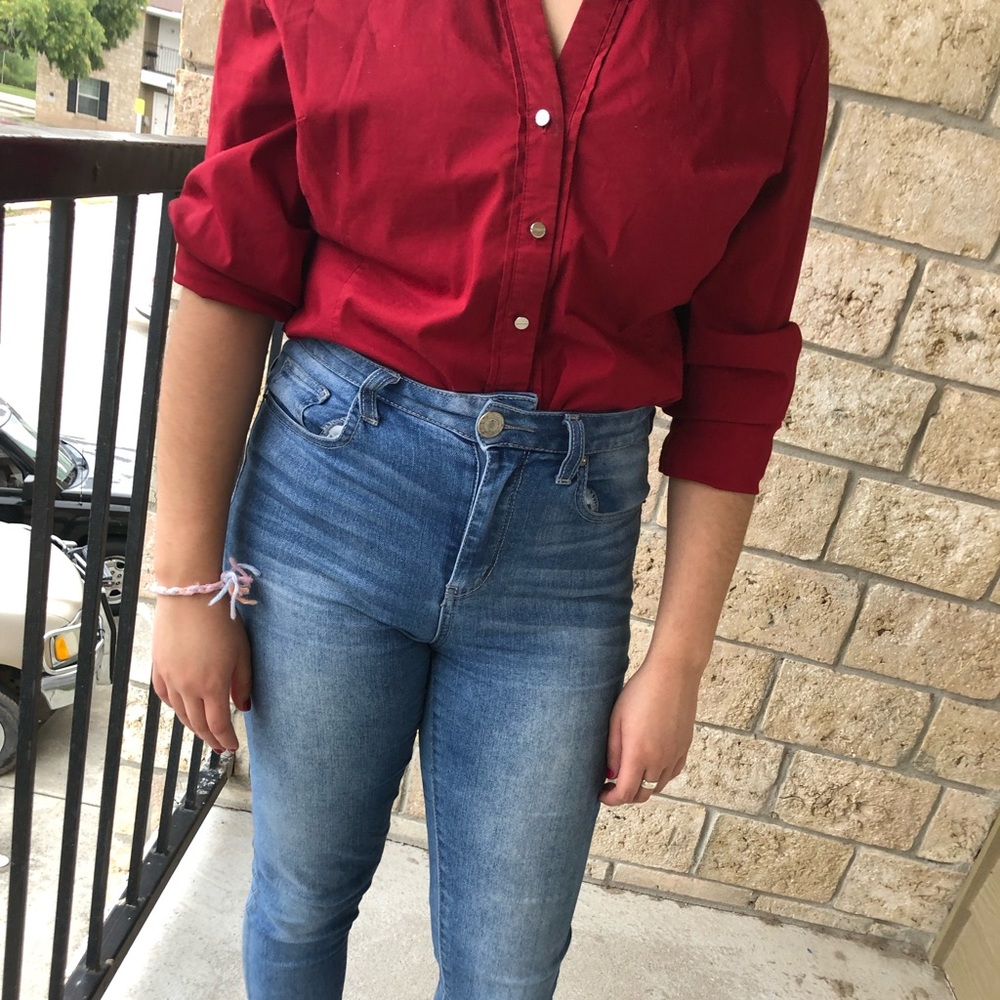 maroon button up shirt